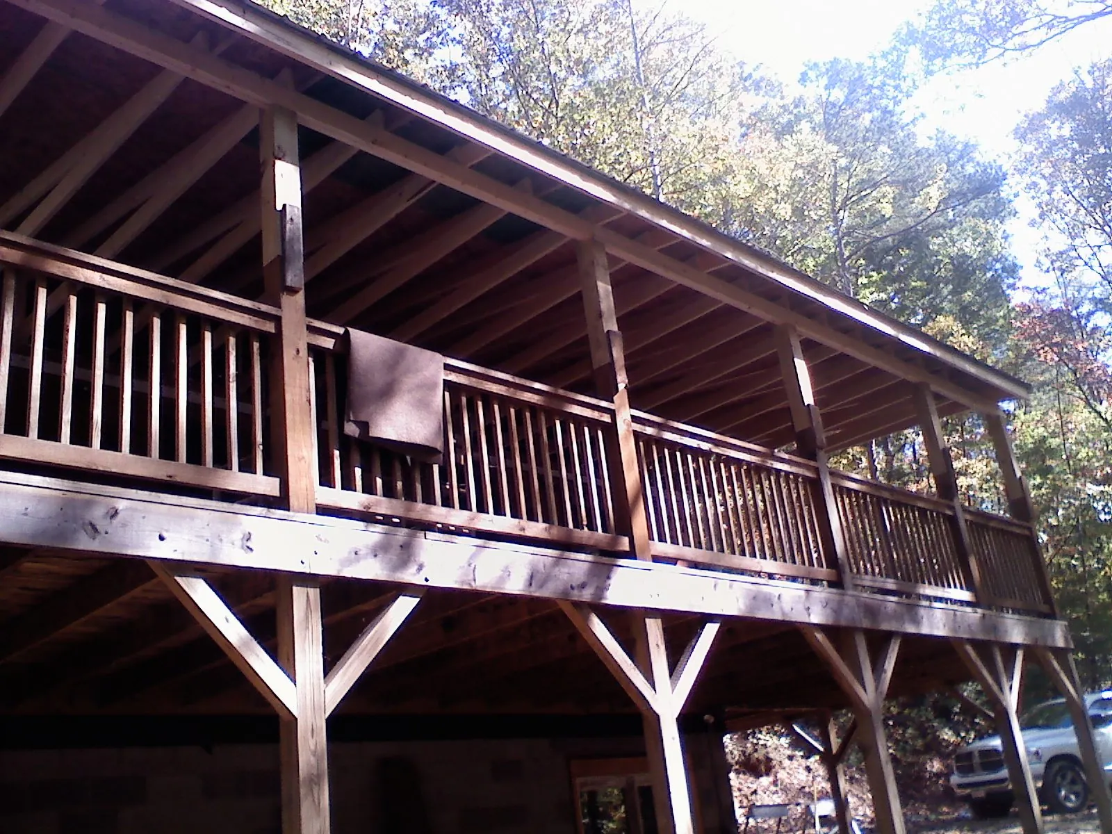 Timber framing under a new elevated porch and deck — Roof Leak Repair in Griswold by Roofing Brothers